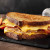 The Ultimate Hangover Burger: Egg in a Hole Burger Grilled Cheese